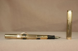 You can see on this gold-fill Conklin circa 1900 the crescent that would keep the pen from rolling off Twain's desk.