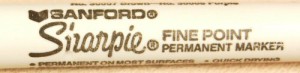 The Sharpie marker can write on most any surface with a permanent ink. This older Sharpie still shows the Sanford coporate logo.