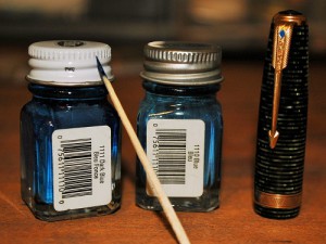 Use Testor's paints to fill in the blue diamond of your Parker Vacumatic clips. Some clips have old paint that tells how dark you should repaint it. Testor's 1111 Dark Blue paint is good for darker blue diamonds and 1110 is good for lighter blue diamonds. I used the 1110 Blue on the Vac Major you see in this photo. Also shown is a toothpick I use for the painting process.