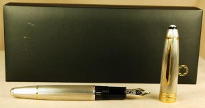 We have a sterling silver Mont Blanc 146 LeGrand fountain pen that is very similar to Bond's. Unfortunately, it only holds ink. DO NOT load it with acid!